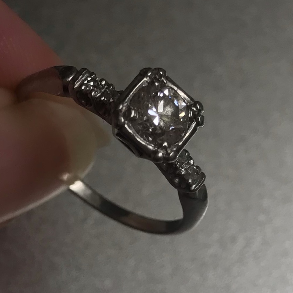 Platinum diamond ring 3/4K center